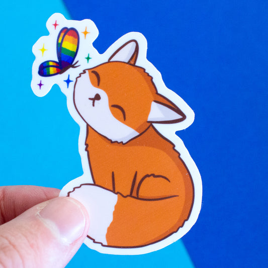 Queer raccoon with rainbow flag sticker