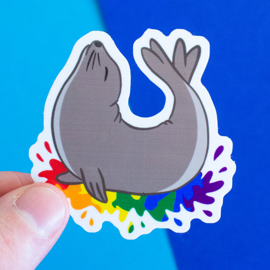 Queer raccoon with rainbow flag sticker